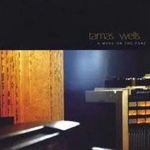 Tamas Wells歌曲:A Dark Horse Will Either Run First or Last歌词
